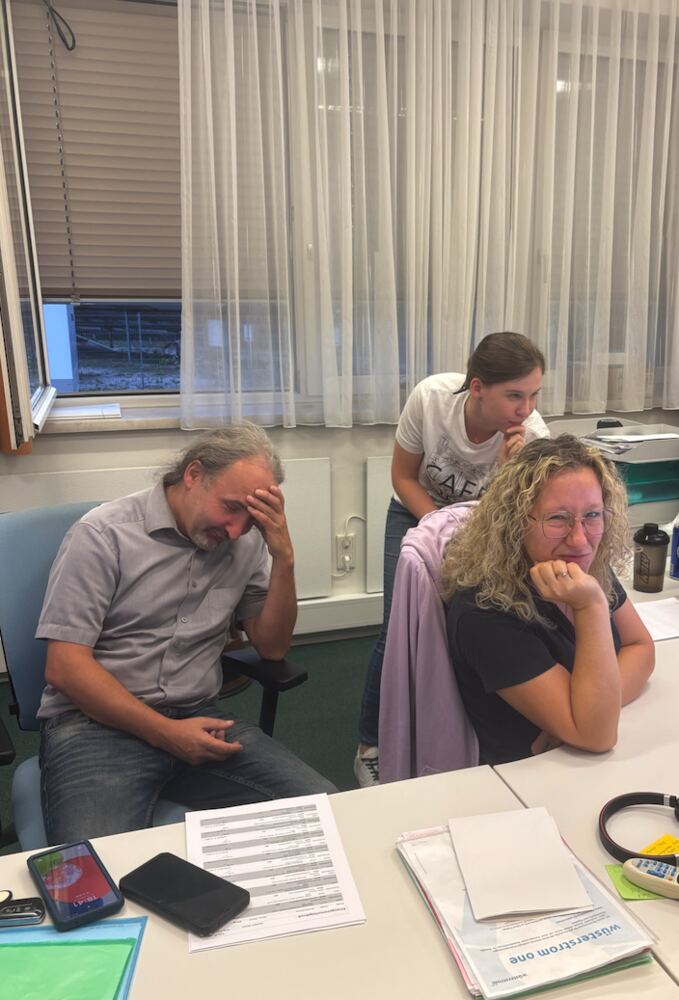 Team bei der Einführung neuer Systeme